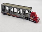 Disney Auta Cars Maniek Ciężarówka Transporter Laweta Mattel K2933