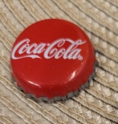 Kapsel Coca Cola butelkowane