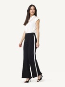 BONPRIX GLOOCKLER czarne spodnie z białą lamówką lampasem r. M/38