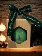 Świeczka zapakowana na prezent