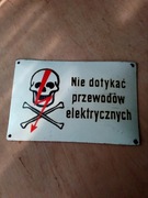 Stara tablica informacyjno-ostrzegawcza 