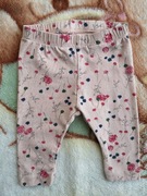 Łososiowe bawełniane spodnie legginsy w kwiatki Name It 62 jak nowe