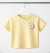 Dziewczęcy t-shirt w kolorze żółtym z nadrukiem jednorożca, H&M  134/140