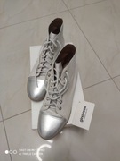 Markowe, skórzane buty srebrne marki Ryłko. 