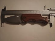 Scyzoryk z otwieraczem do butelek.