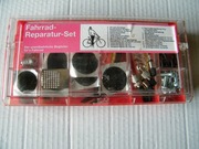 zestaw narzędzi i różnych części do naprawy roweru - produkcji niemieckiej