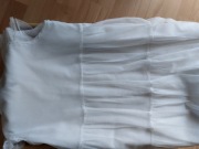 Biała sukienka falbanki 116