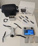 DJI Mini 3 Fly More Combo DJI RC + 3 baterie - stan idealny dron a
