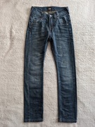 Granatowe bawełniane spodnie jeansowe jeansy Lee model Pooler 134