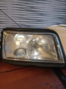Audi 100 C4 lampy przód Hella soczewki halogen 