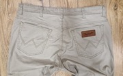 Beżowe Spodnie męskie jeans Wrangler Texas W38L32