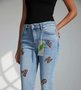 Jeansy M.Sara-push up - haftowane litery z dżetami XS