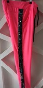 Spodnie dresowe z lampasami MiLady neonowy róż 