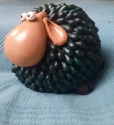 Figurka promocyjna gry planszowej Owczy pęd czarna