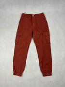damskie malinowe spodnie z kieszeniami cargo Kargo do kosztek wygodne