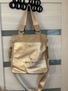 Złota torebka Caely Bags szerokie pasy