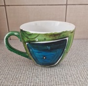 Duży zielony kubek z pracownii Inkluz