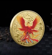 Moneta z czerwonym Fenixem 