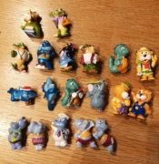 Figurki Kinder niespodzianka hipopotam delfin lwy smerfy prl gumowe dinozau