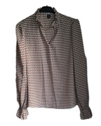 Piękna bluzeczka we wzorek z falbaną r40/42