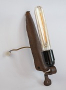 Kinkiet z okucia starego dyszla