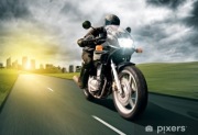 Zdjecie na płótnie motocyklista