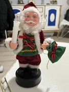 Stara figurka Mikołaja świecąca, grająca muzykę i ruszająca głową rękami 