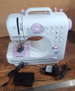 Mini maszyna do szycia łucznik   (226)