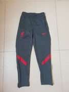 Spodnie Nike siwe rozm. M 137-147 cm.Lat 10-11