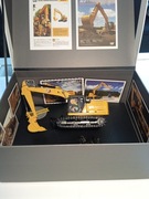 Model koparki Cat 323, skala 1:50
