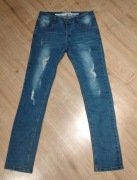 Jeansy z rozdarciami 38