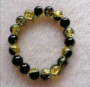 Czarno-żółta bransoletka crackle