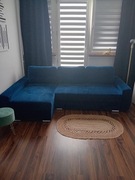 Sofa narożna do salonu z funkcją spania