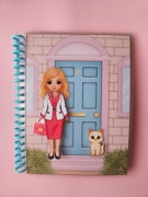 Interaktywna książka na rzepy - domek z lalką i kotem