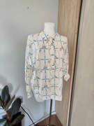 Koszula damska kremowa, wzór łańcuchów, wycięcie na plecach, r. Uniwersalny