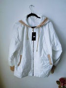 Kurtka wiosenna plus size biała pikowana z kapturem lekka elegancka 