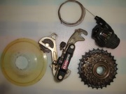 PRZERZUTKA SHIMANO RD-TY18, WOLNOBIEG MF-TZ20 MANETKA OSŁONA