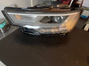 Oryginalny reflektor przedni lewy AudiA6 4K0941033