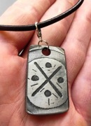 Trawiony amulet słowiański