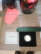 Replika monety Rybak z 1958 r. o nominale 5 złotych.