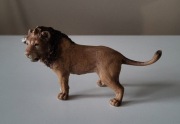 Schleich lew z podniesioną łapą figurka model wycofany z 2007 r.