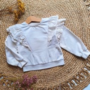 Bluza z falbankami 98 koronkowymi falbanki beżowa ecru elegancka falbany k