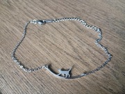 Regulowana srebrna bransoletka ze stali nierdzewnej. Kot na linie