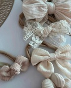 Opaski niemowlęce kremowe