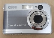 Aparat cyfrowy Ricoh RR530, uruchamia się, nietestowany 