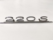 Emblemat od osłony zaślepki na radio Mercedes-Benz 220 S