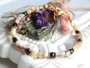 Bransoletka z naturalnej muszli wałki  & Onyks  Handmade