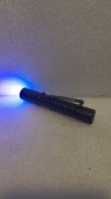 Mini latarka LED UV na jedną baterie AAA 