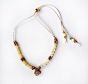 Bransoletka damska kamienie naturalne jedwab masa perłowa żółta złota biżu