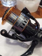 Kołowrotek  spinningowy , przełożenie 5,2:1, słona lub słodka woda, 7000